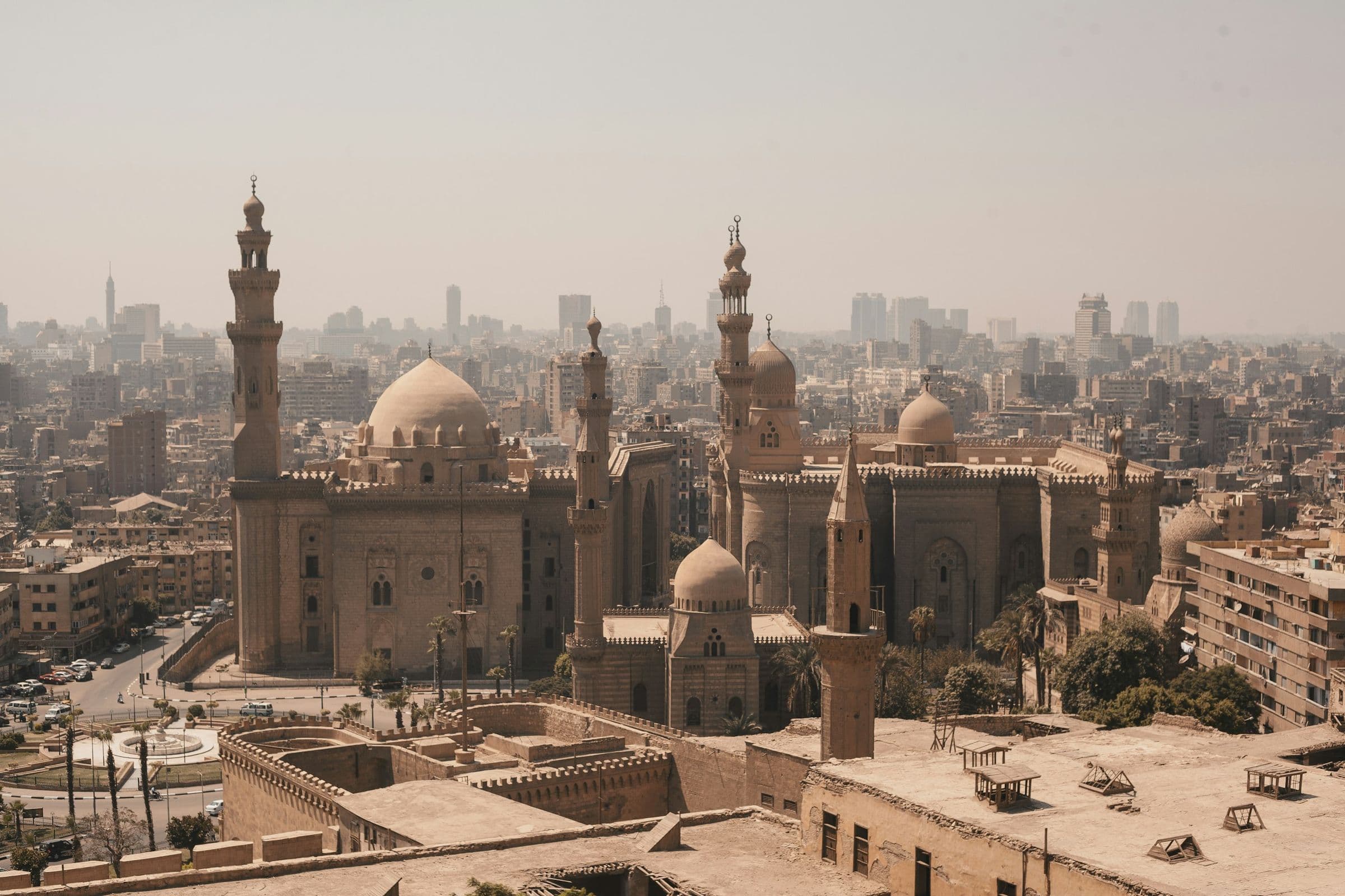 The minarets of the Sultan Hassan and Al-Rifa’i mosques over historic Cairo