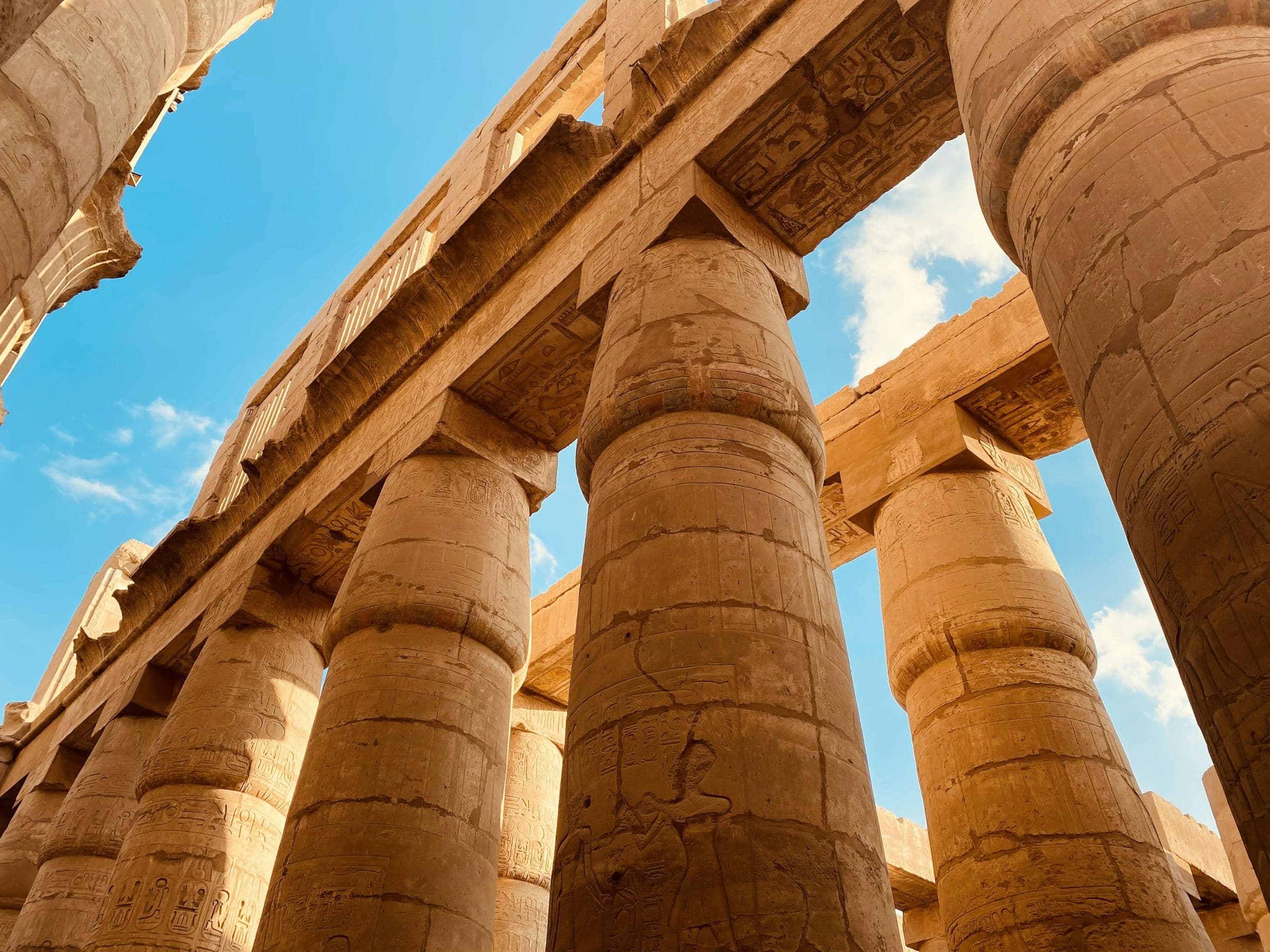 Looking up through the giant papyrus columns of Karnak