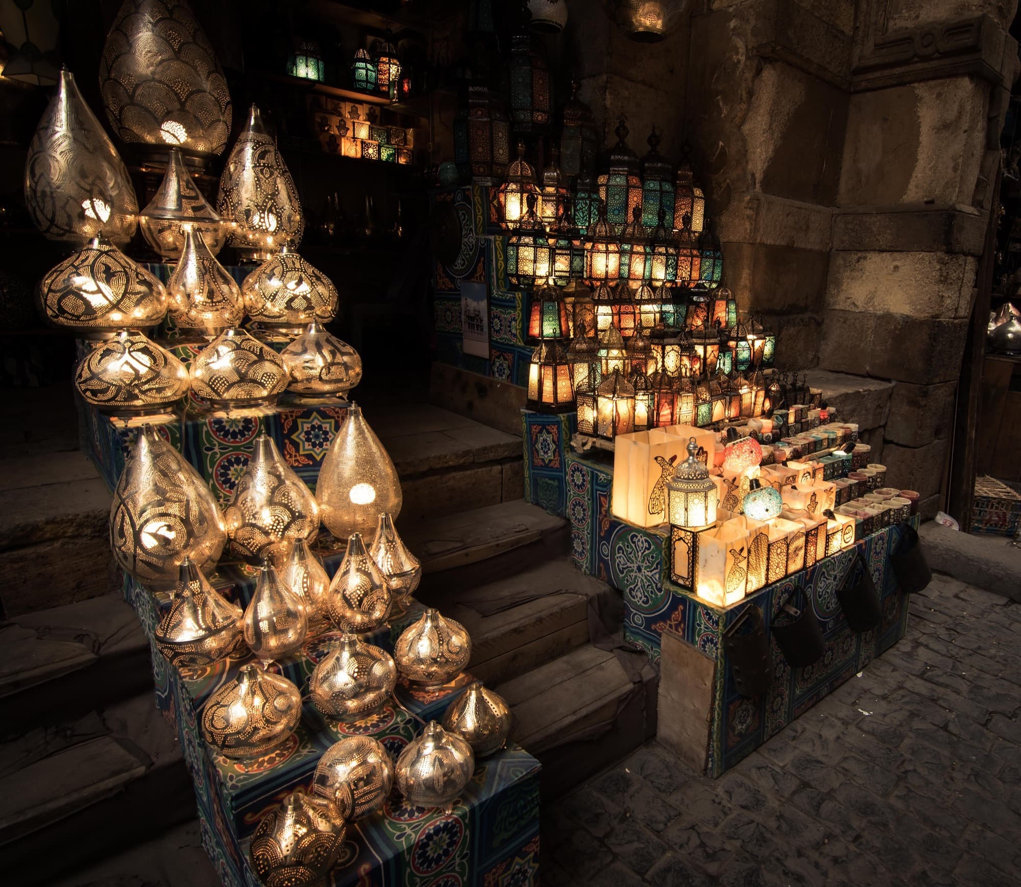 Brass lanterns glowing in a lane of Khan el-Khalili
