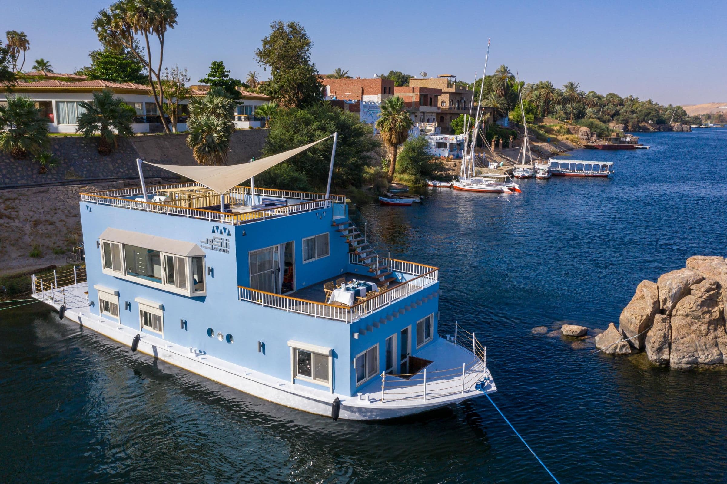 Anakob moored among the granite boulders of Aswan