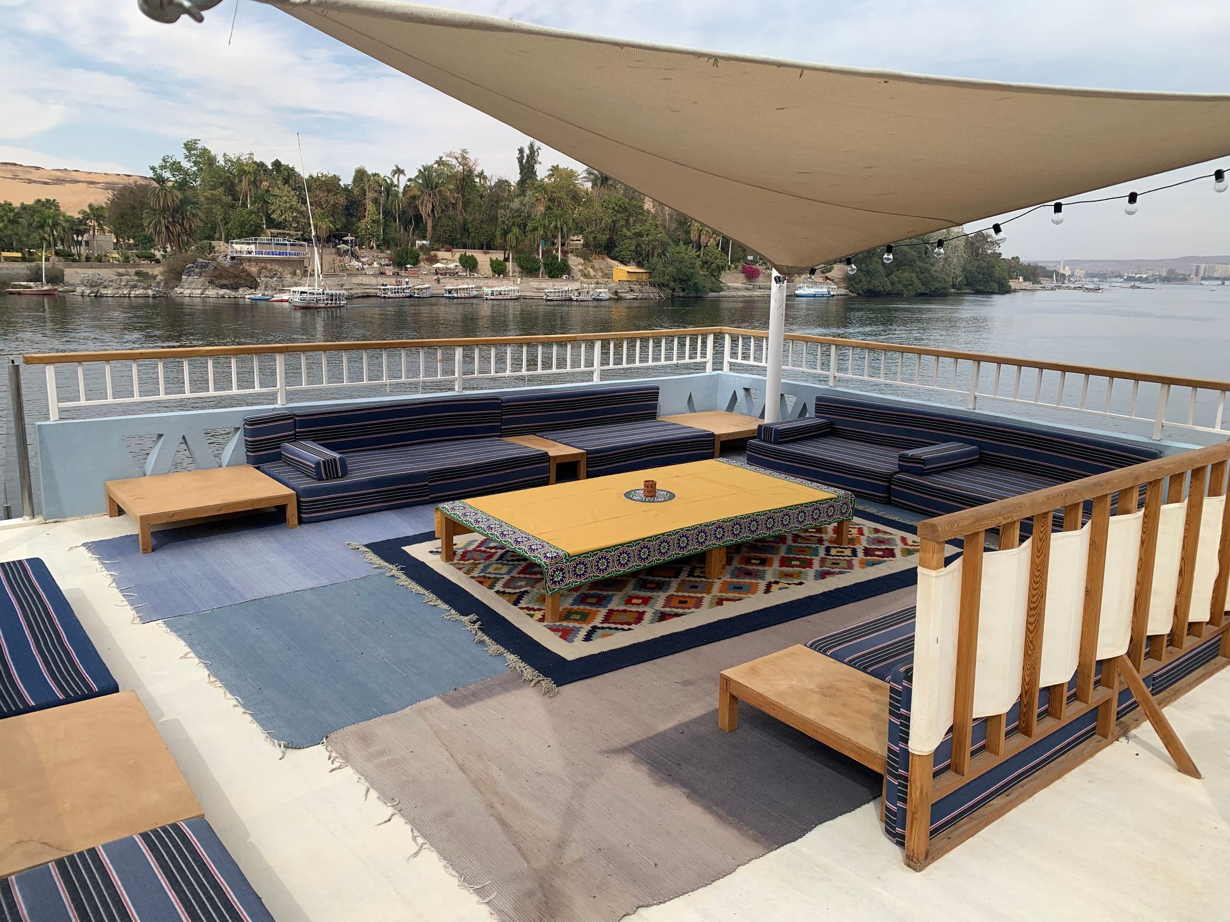 Lounge seating under Anakob’s felucca-shaped sundeck shade